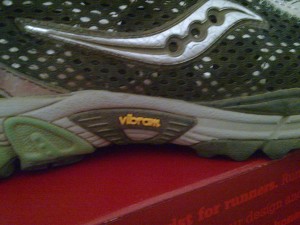 Saucony ProGrid Xodus Trail Running Shoe with Vibram Outsole closeup logo.