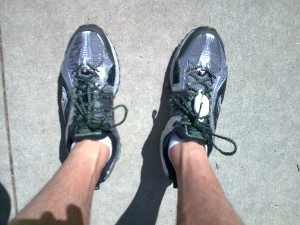 Saucony ProGrid Xodus Trail Running Shoe with Vibram Outsole action shot.